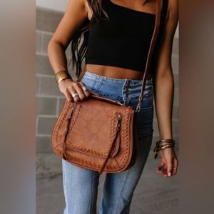Urban expressions cross body saddle bag in cognac